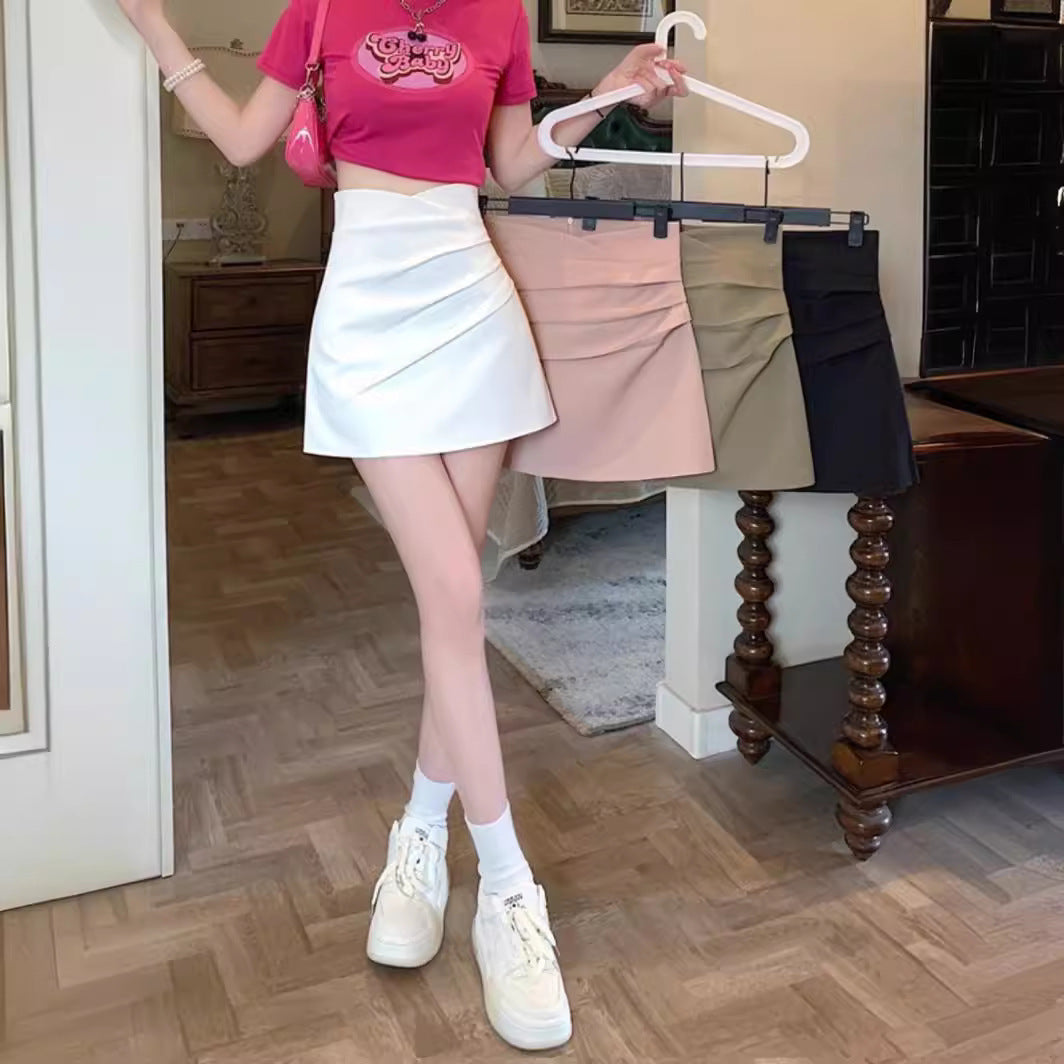 Summer 2023 New High-Waisted Hip-Hugging A-Line Short Skirt with Irregular Design Pleated Mini Skirt Sexy Black