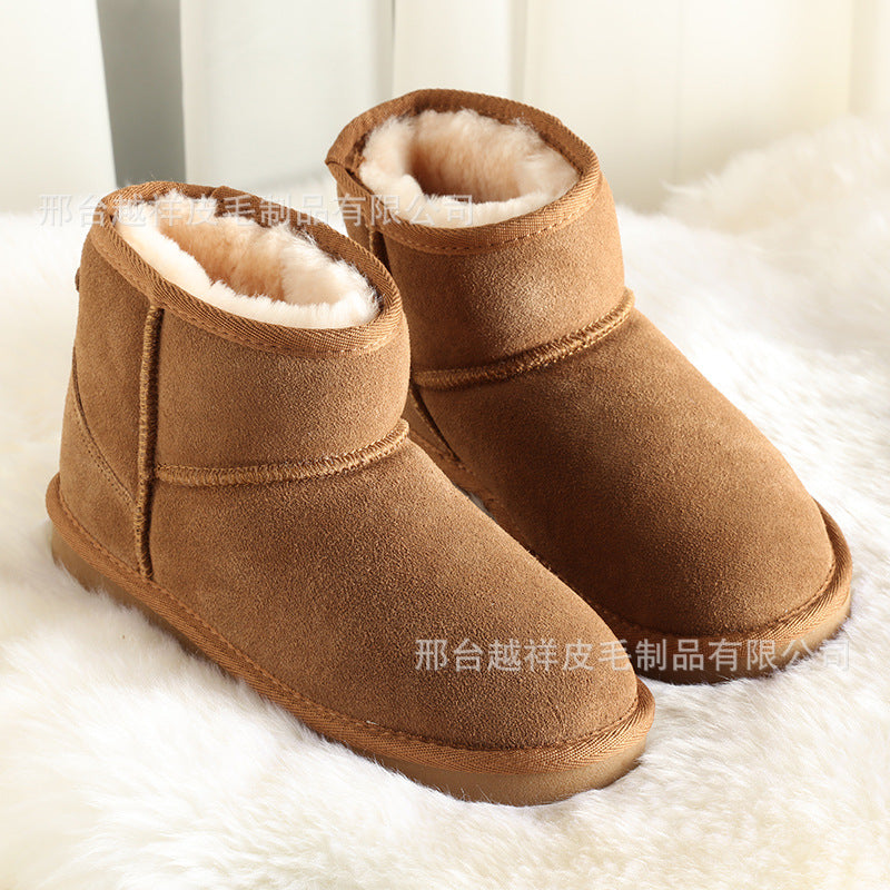 Sheepskin thick-soled snow boots women's winter fur one-piece short tube warm men's waterproof non-slip thick large cotton shoes